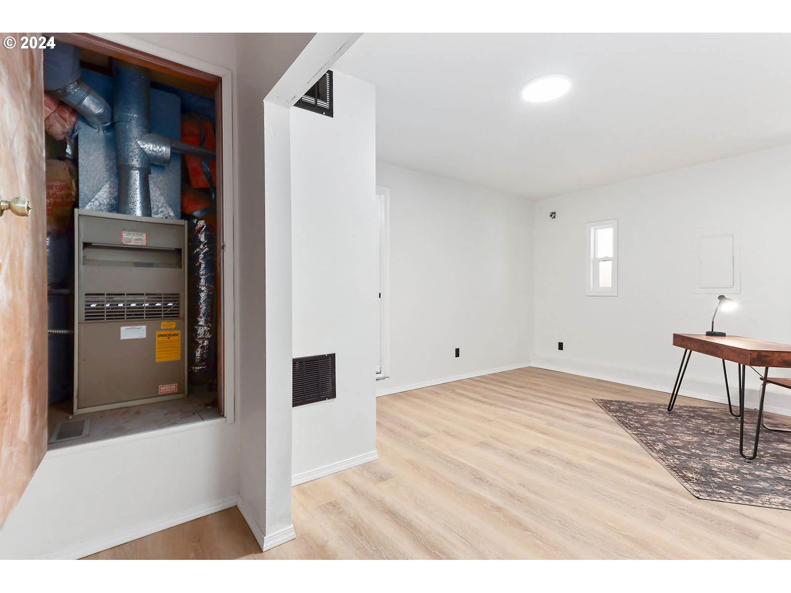 1710 B Street Hood River, OR 97031 - Photo 13 of 42 a view of a bedroom with furniture and staircase