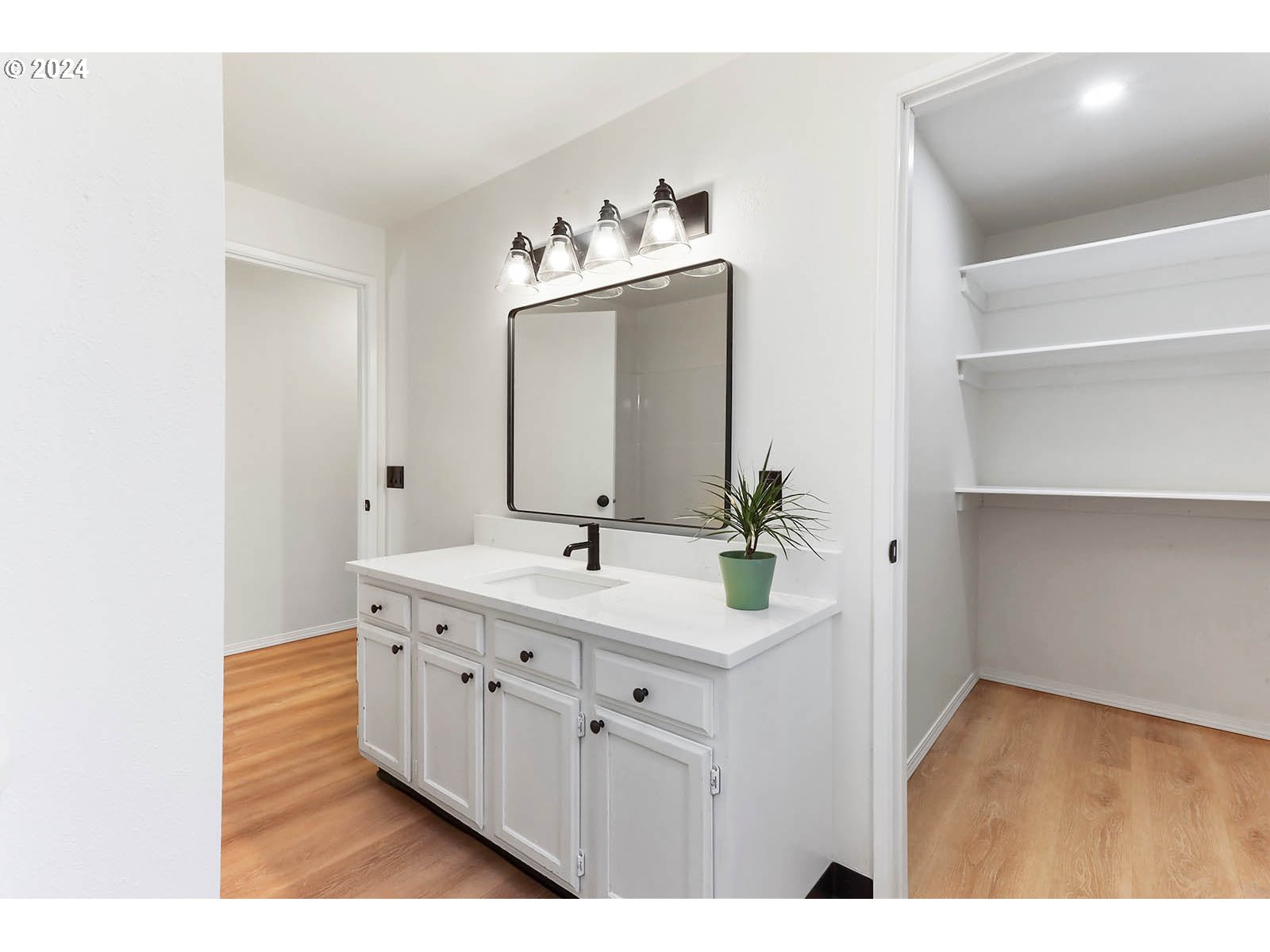 1710 B Street Hood River, OR 97031 - Photo 19 of 42 a bathroom with a sink double vanity and a mirror