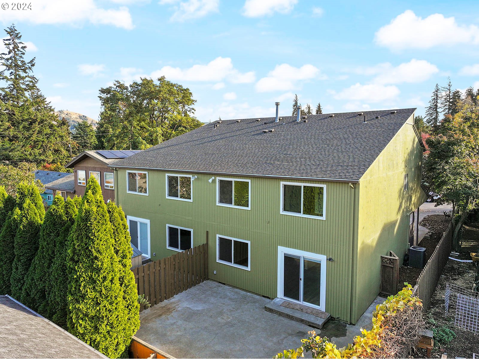 1710 B Street Hood River, OR 97031 - Photo 2 of 42 a front view of a house with a yard