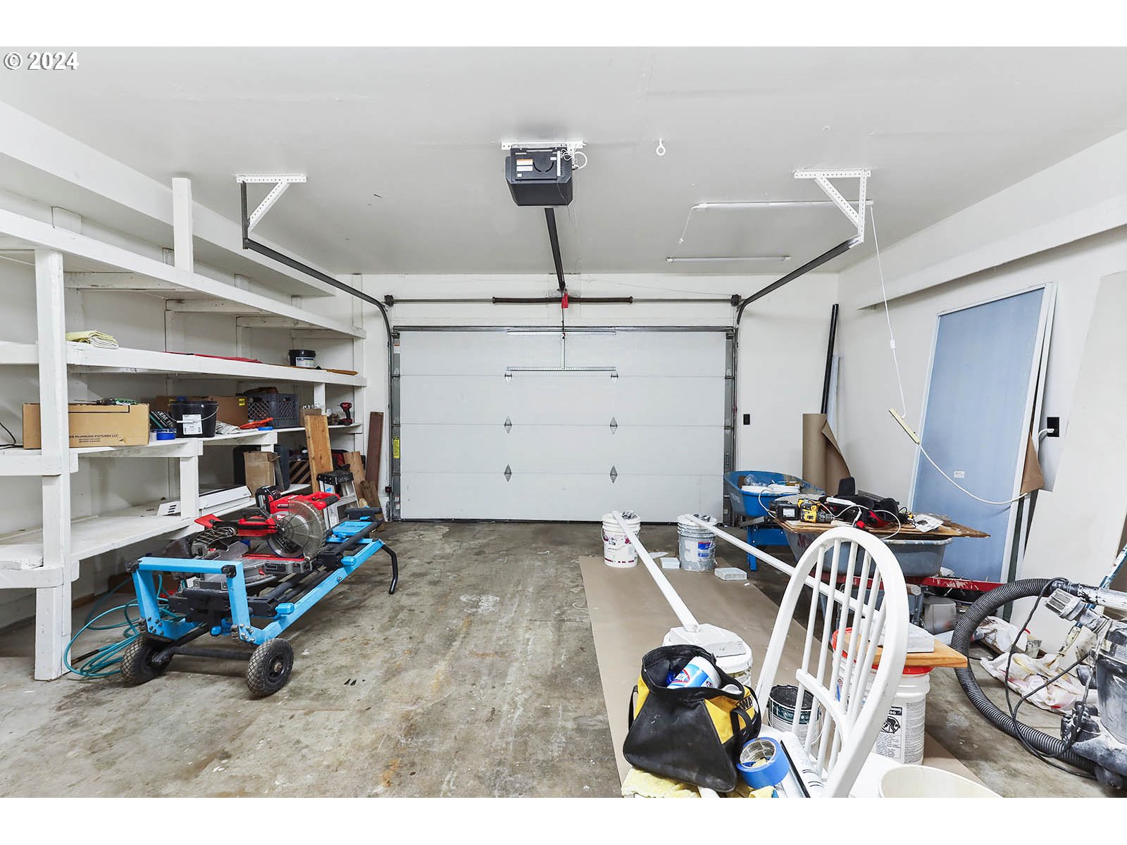 1710 B Street Hood River, OR 97031 - Photo 34 of 42 a bedroom with furniture and workout equipment