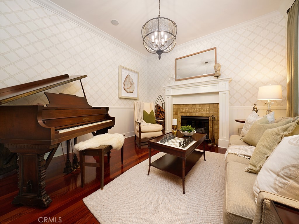 28291 Williams Canyon Road Silverado, CA 92676 - Photo 10 of 74 a living room with furniture a piano and a fireplace
