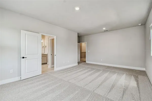 a bathroom with a bathtub and a sink