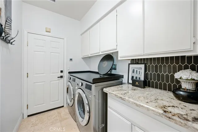 a kitchen with a stove and a sink