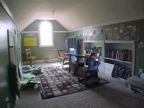 1110 East Sandy Ridge Road Monroe, NC 28112 - Photo 7 of 8 a living room with furniture and a wooden floor