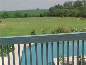 1110 East Sandy Ridge Road Monroe, NC 28112 - Photo 8 of 8 a balcony with an ocean view