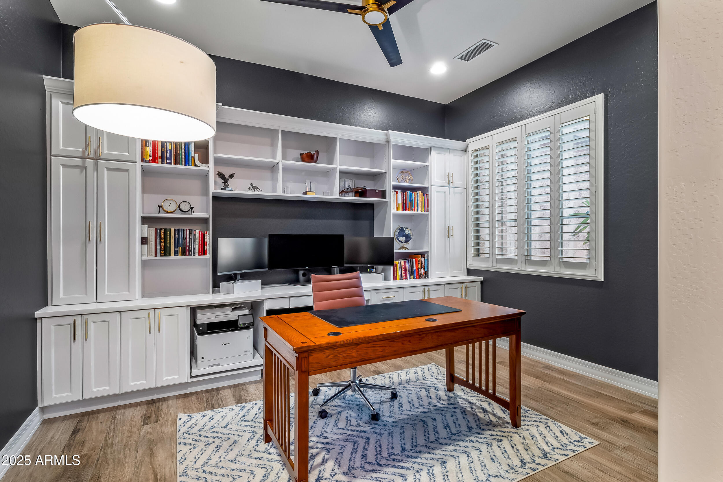 2955 East Blue Sage Road Gilbert, AZ 85297 - Photo 16 of 55 a view of a dining room with furniture window and wooden floor