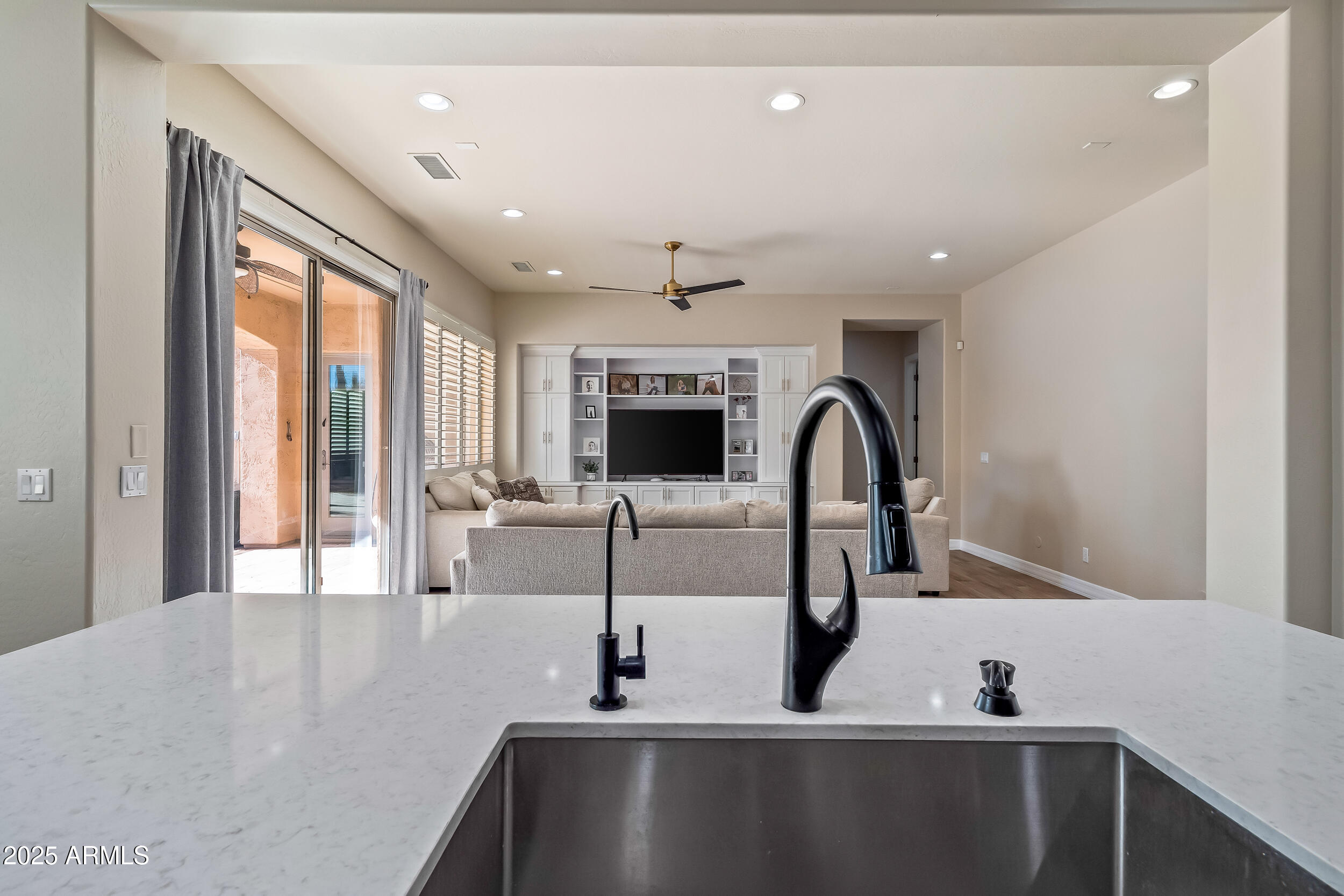 2955 East Blue Sage Road Gilbert, AZ 85297 - Photo 22 of 55 a view of a kitchen with a sink and a large window