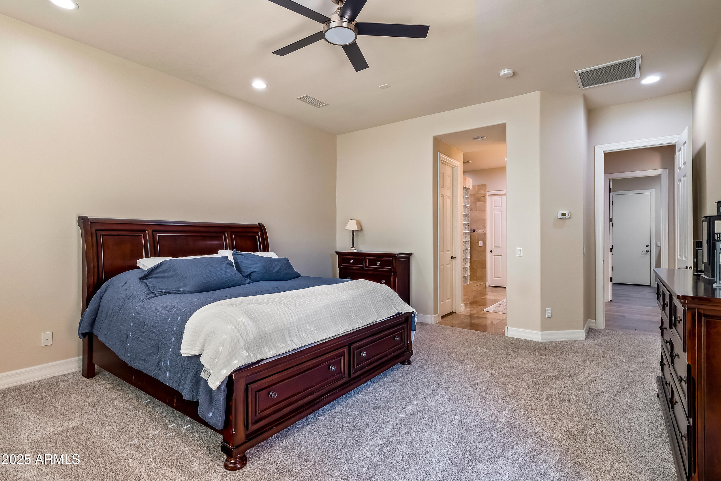 2955 East Blue Sage Road Gilbert, AZ 85297 - Photo 26 of 55 a bedroom with a bed and closet