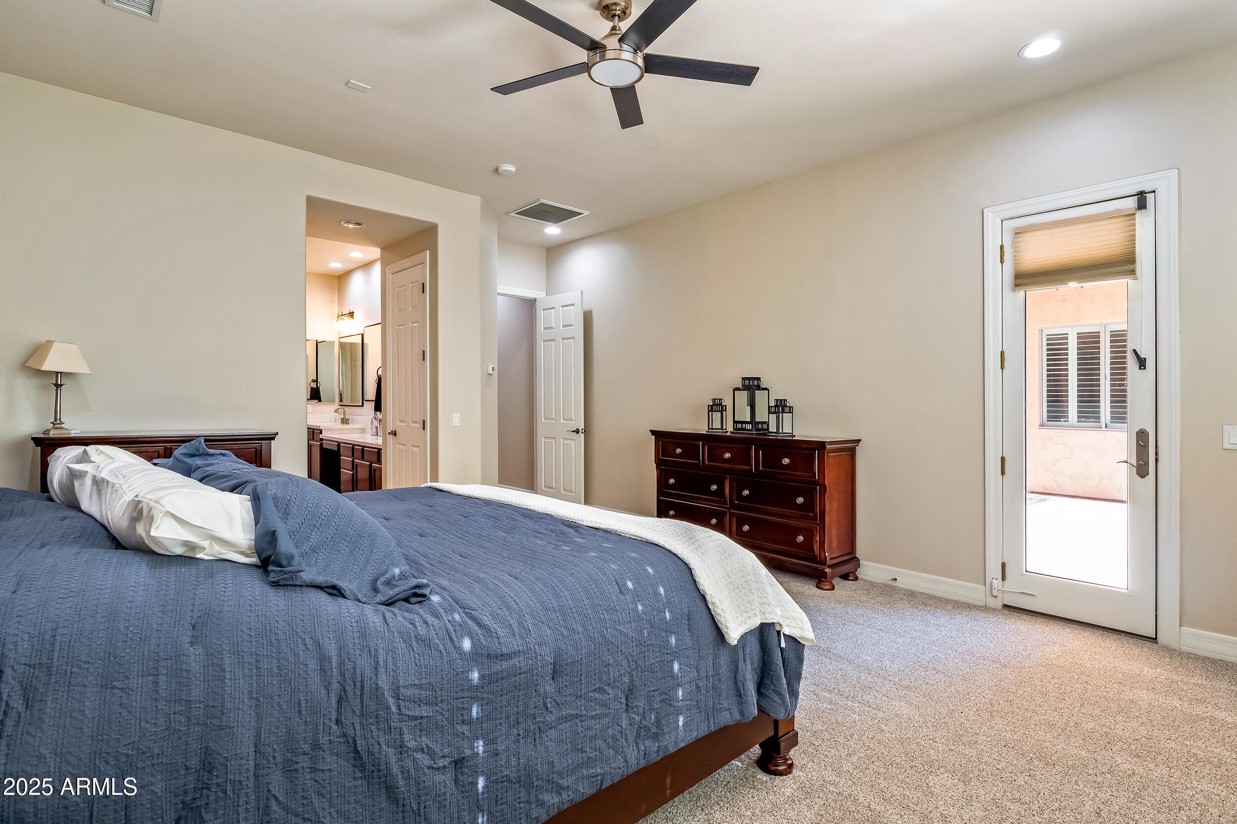 2955 East Blue Sage Road Gilbert, AZ 85297 - Photo 28 of 55 a bedroom with a bed and window
