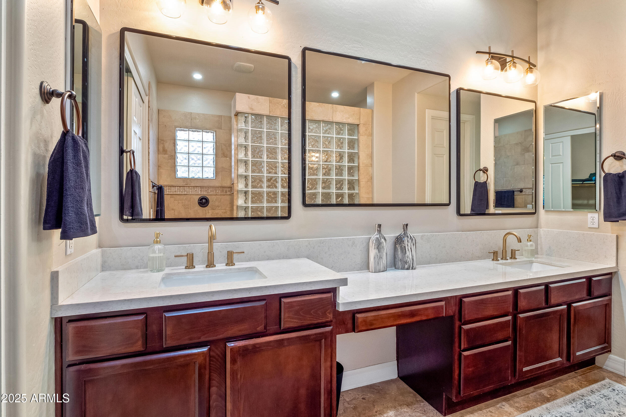 2955 East Blue Sage Road Gilbert, AZ 85297 - Photo 30 of 55 a bathroom with a double vanity sink and a mirror
