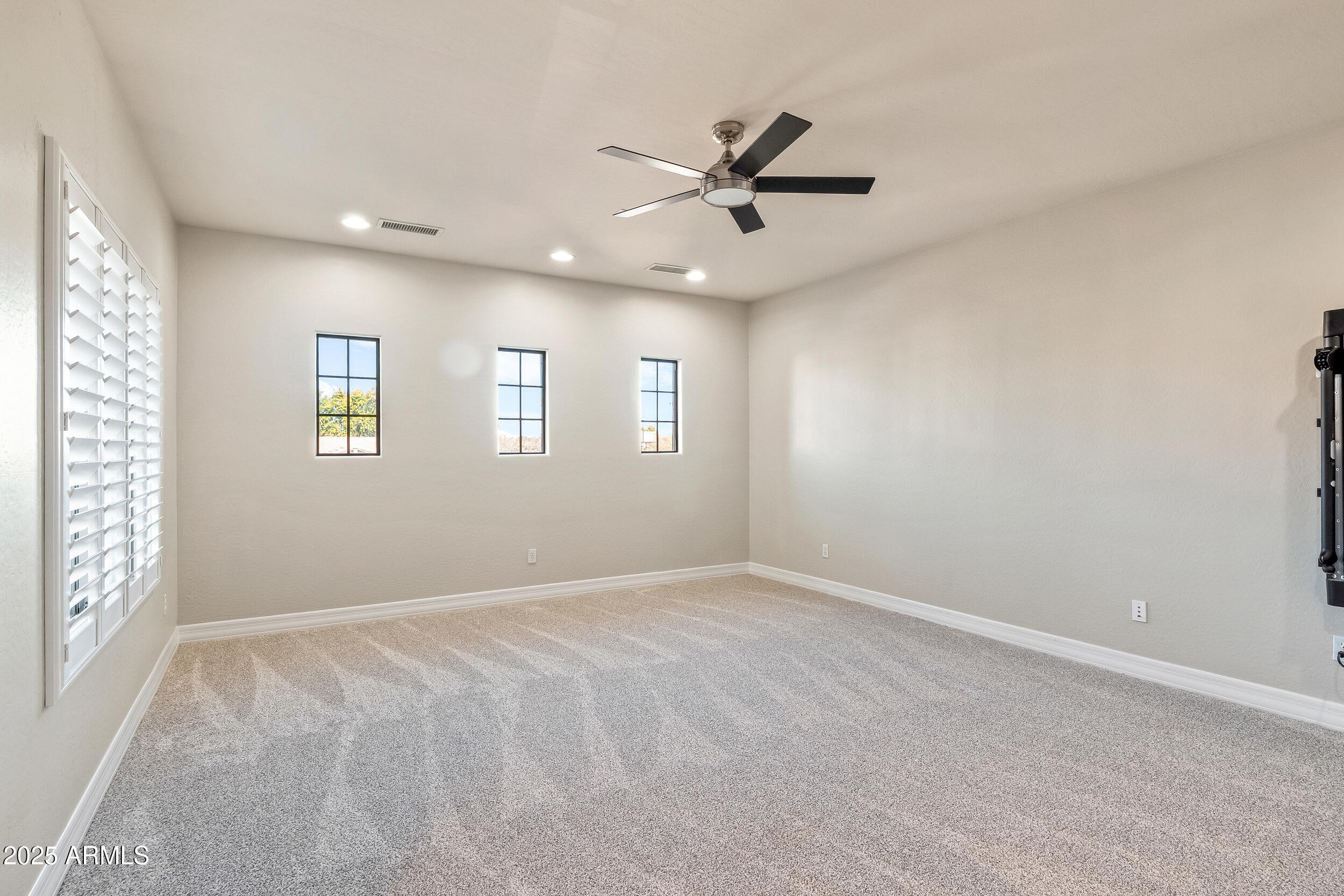 2955 East Blue Sage Road Gilbert, AZ 85297 - Photo 38 of 55 a view of an empty room with a window