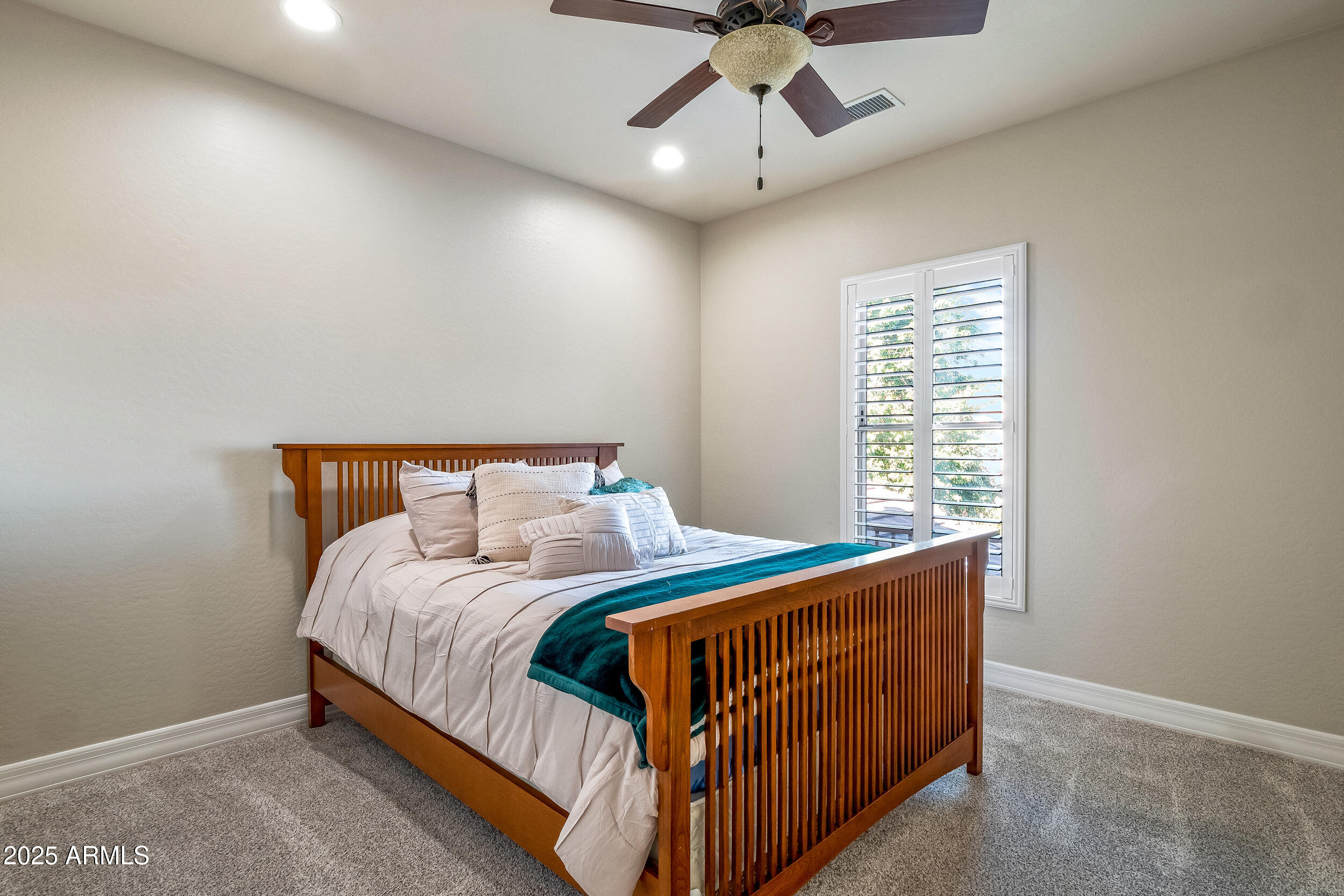 2955 East Blue Sage Road Gilbert, AZ 85297 - Photo 43 of 55 a bedroom with a bed and window