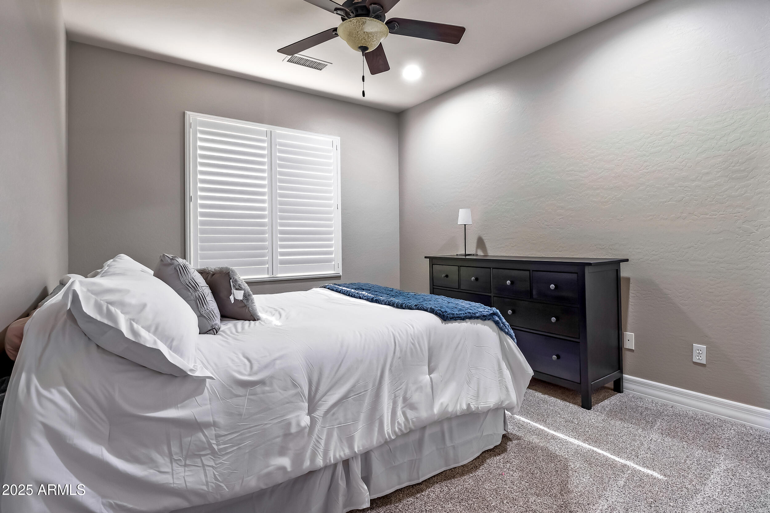 2955 East Blue Sage Road Gilbert, AZ 85297 - Photo 44 of 55 a bedroom with a bed and window