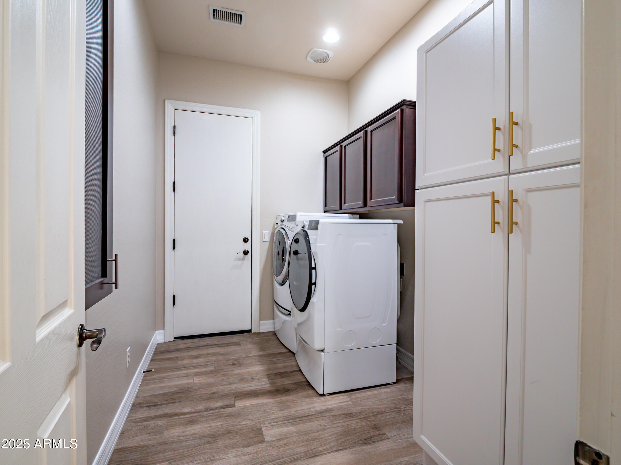 2955 East Blue Sage Road Gilbert, AZ 85297 - Photo 48 of 55 a utility room with dryer and washer
