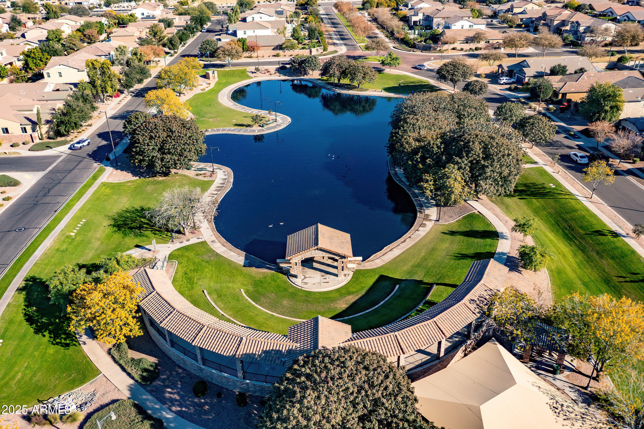 2955 East Blue Sage Road Gilbert, AZ 85297 - Photo 50 of 55 an aerial view of a house with swimming pool and outdoor seating