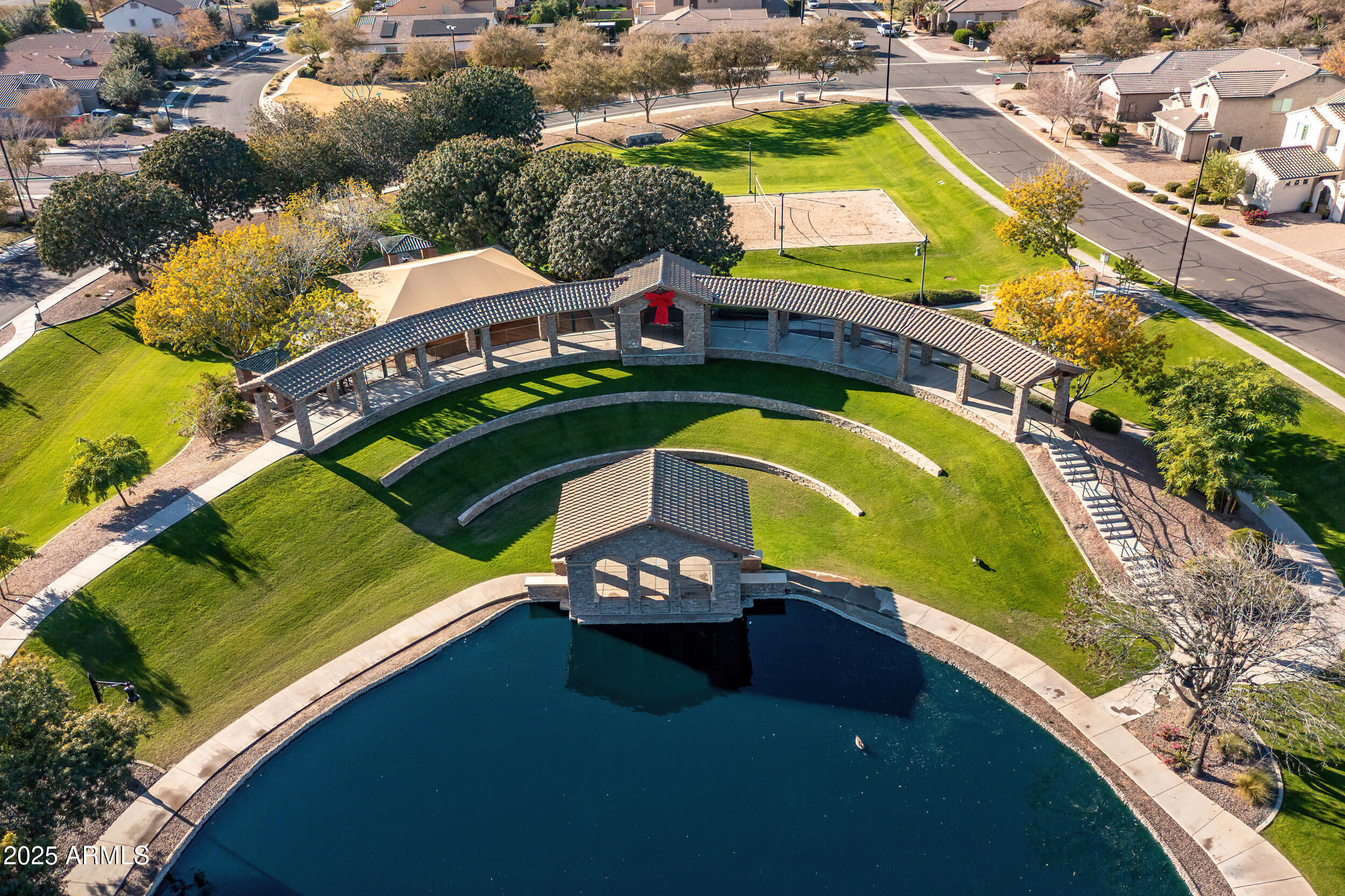 2955 East Blue Sage Road Gilbert, AZ 85297 - Photo 51 of 55 an aerial view of a swimming pool a yard and outdoor seating