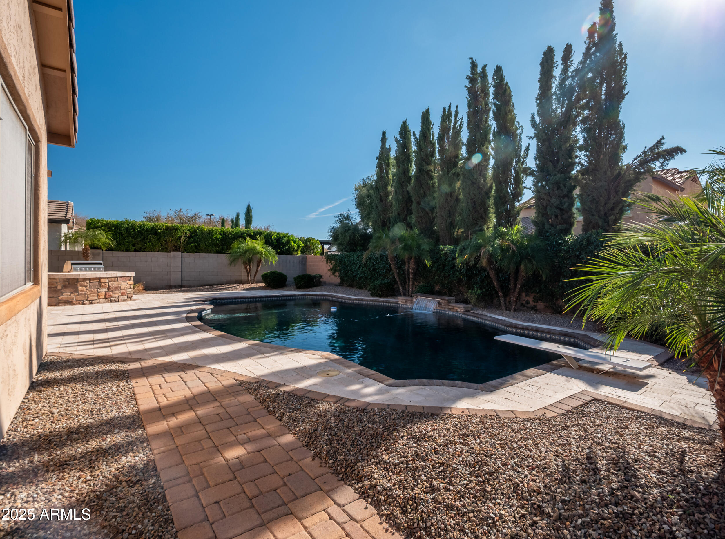 2955 East Blue Sage Road Gilbert, AZ 85297 - Photo 6 of 55 a view of swimming pool with a patio
