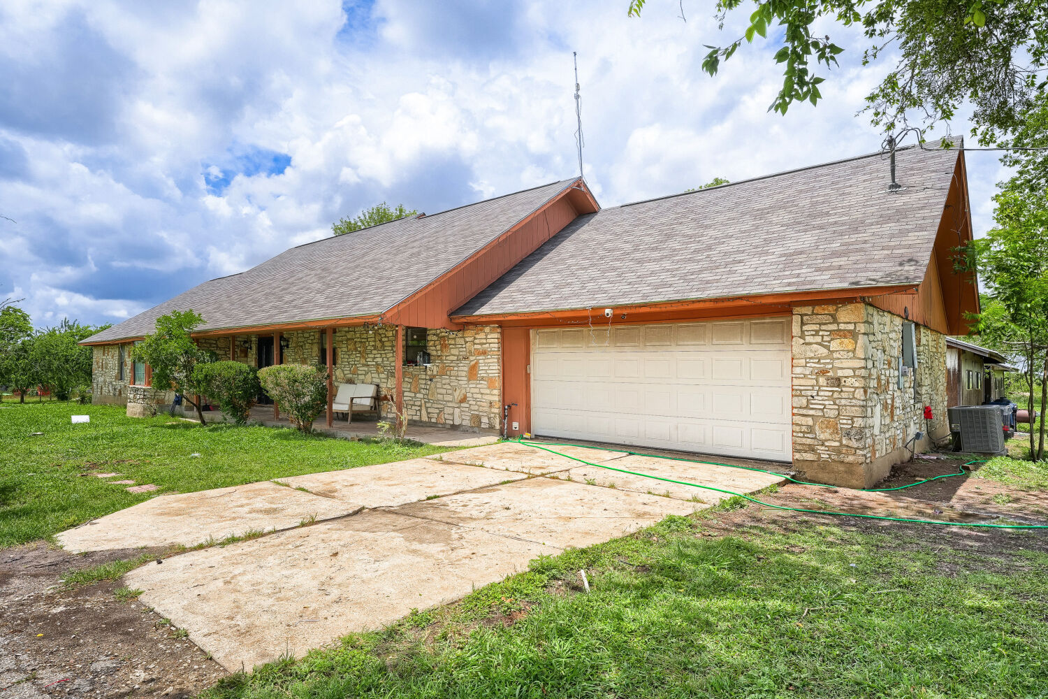 14520 Bois-D-Arc Road Manor, TX 78653 - Photo 6 of 21 a front view of a house with a yard