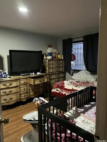 a room with furniture and flat screen tv