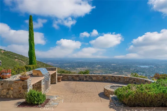 a front view of a house with yard