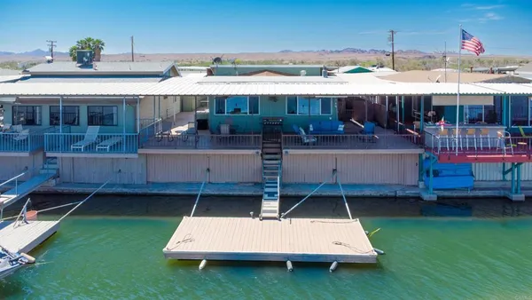 a table and chairs in front of a building