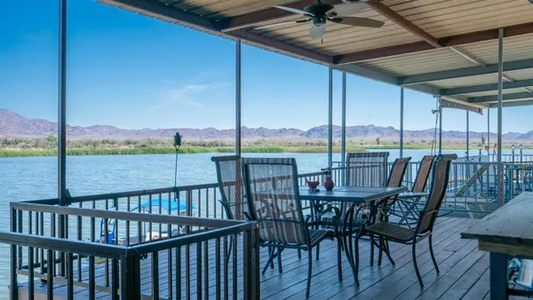 a view of balcony with wooden floor and outdoor space