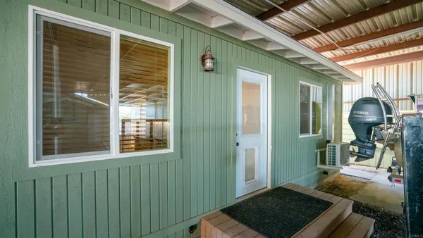 a view of a backyard of a house