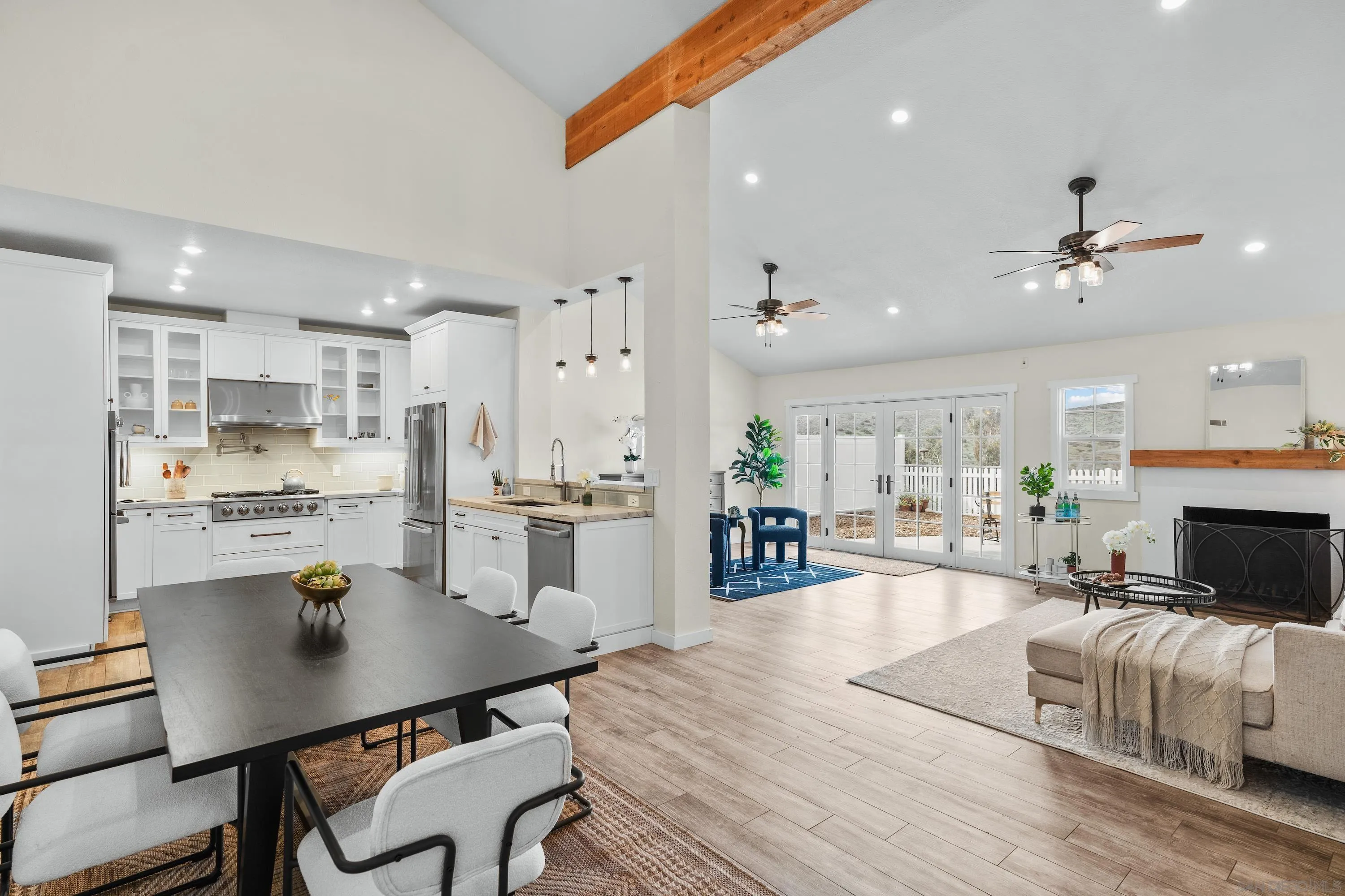 10472 Cadwell Road Santee, CA 92071 - Photo 1 of 30 a living room with stainless steel appliances kitchen island furniture and a view of kitchen