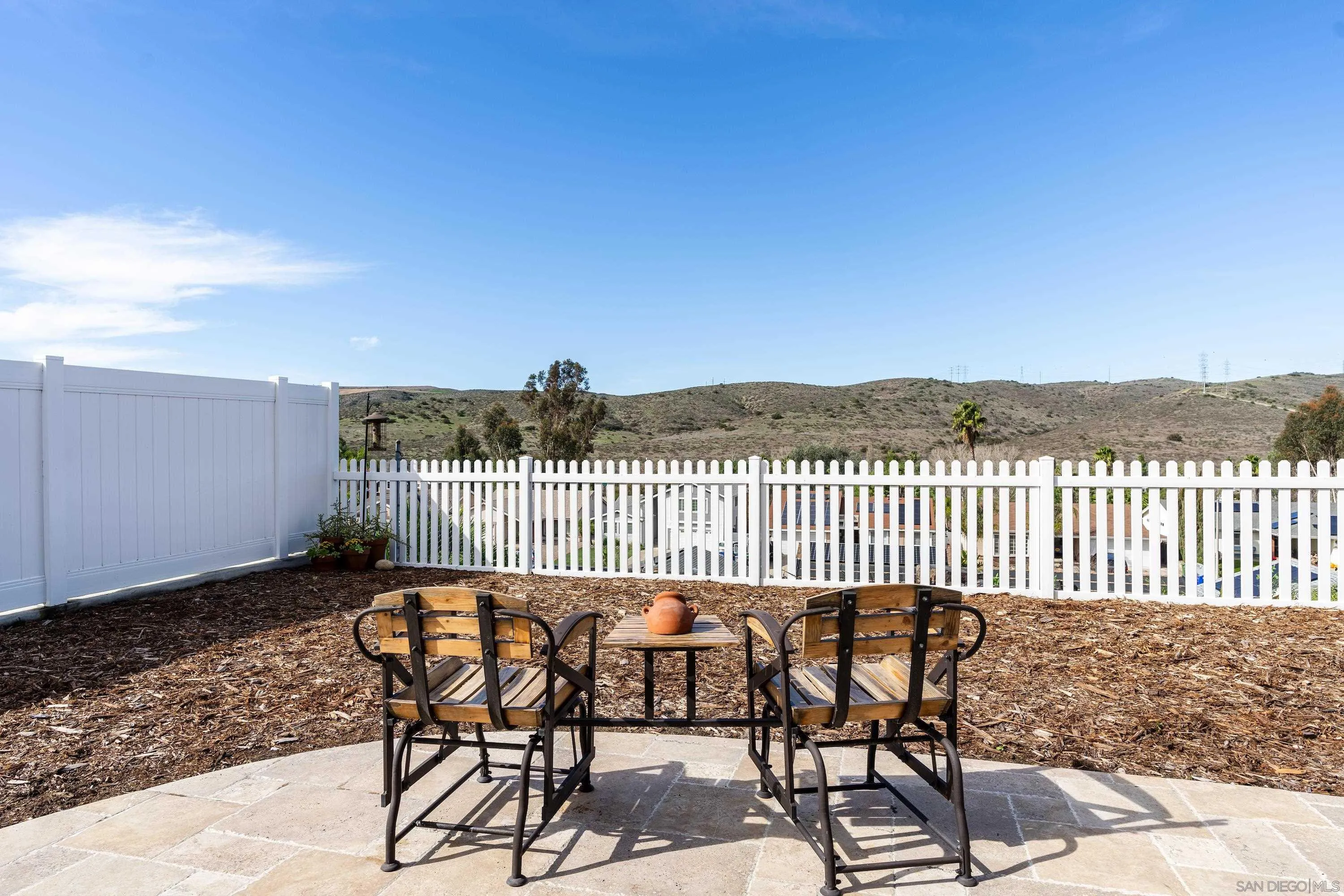 10472 Cadwell Road Santee, CA 92071 - Photo 14 of 30 a view of a chairs and table on the terrace