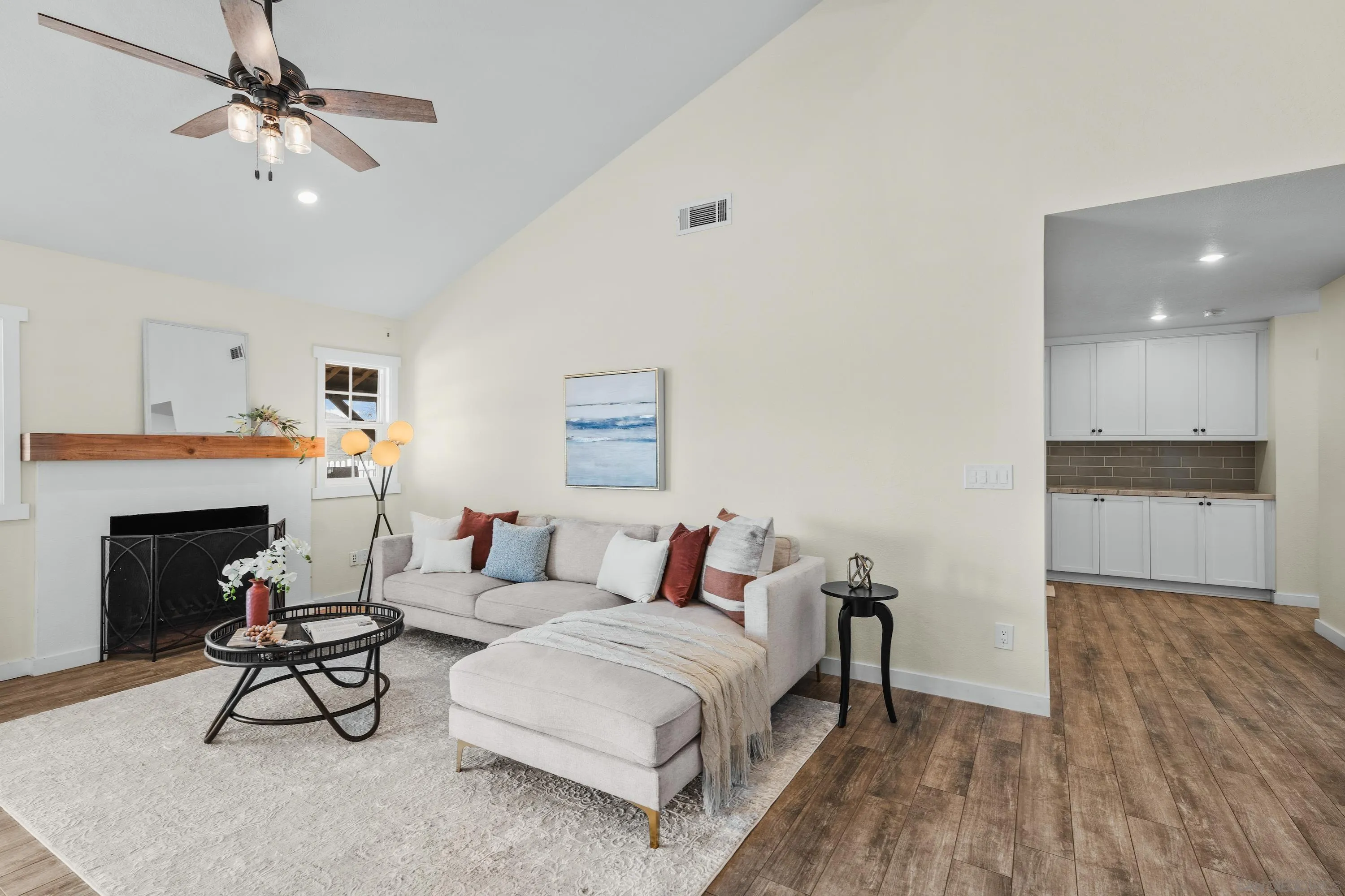 10472 Cadwell Road Santee, CA 92071 - Photo 19 of 30 a living room with furniture and a fireplace