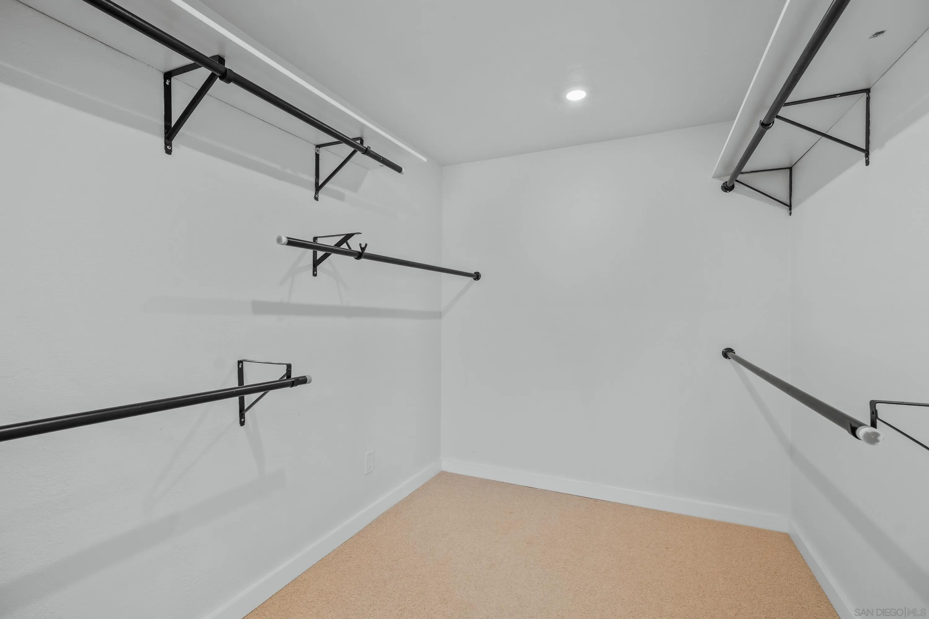 10472 Cadwell Road Santee, CA 92071 - Photo 24 of 30 a view of small space with racks on the wall