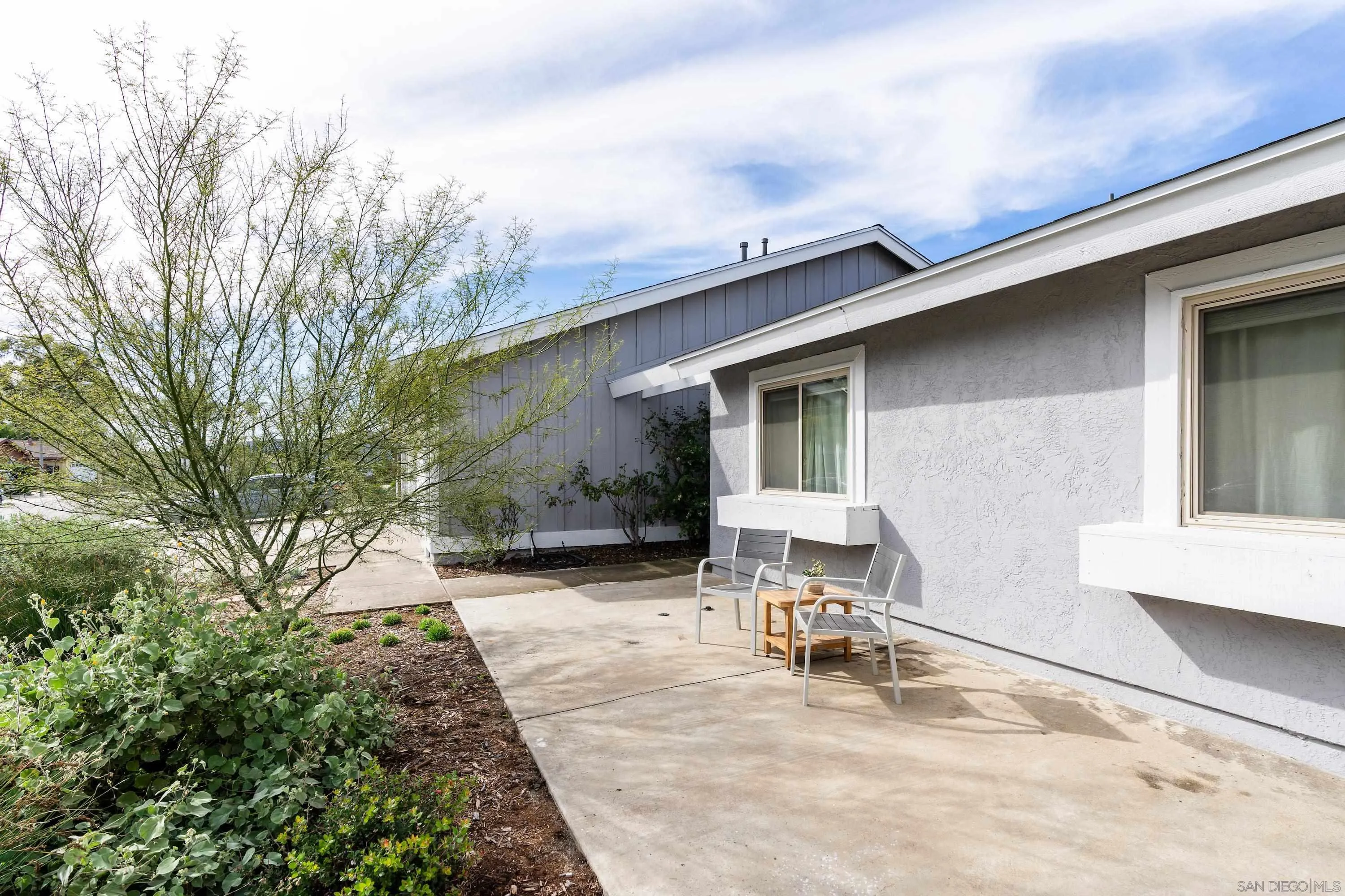 10472 Cadwell Road Santee, CA 92071 - Photo 28 of 30 a backyard of a house with table and chairs