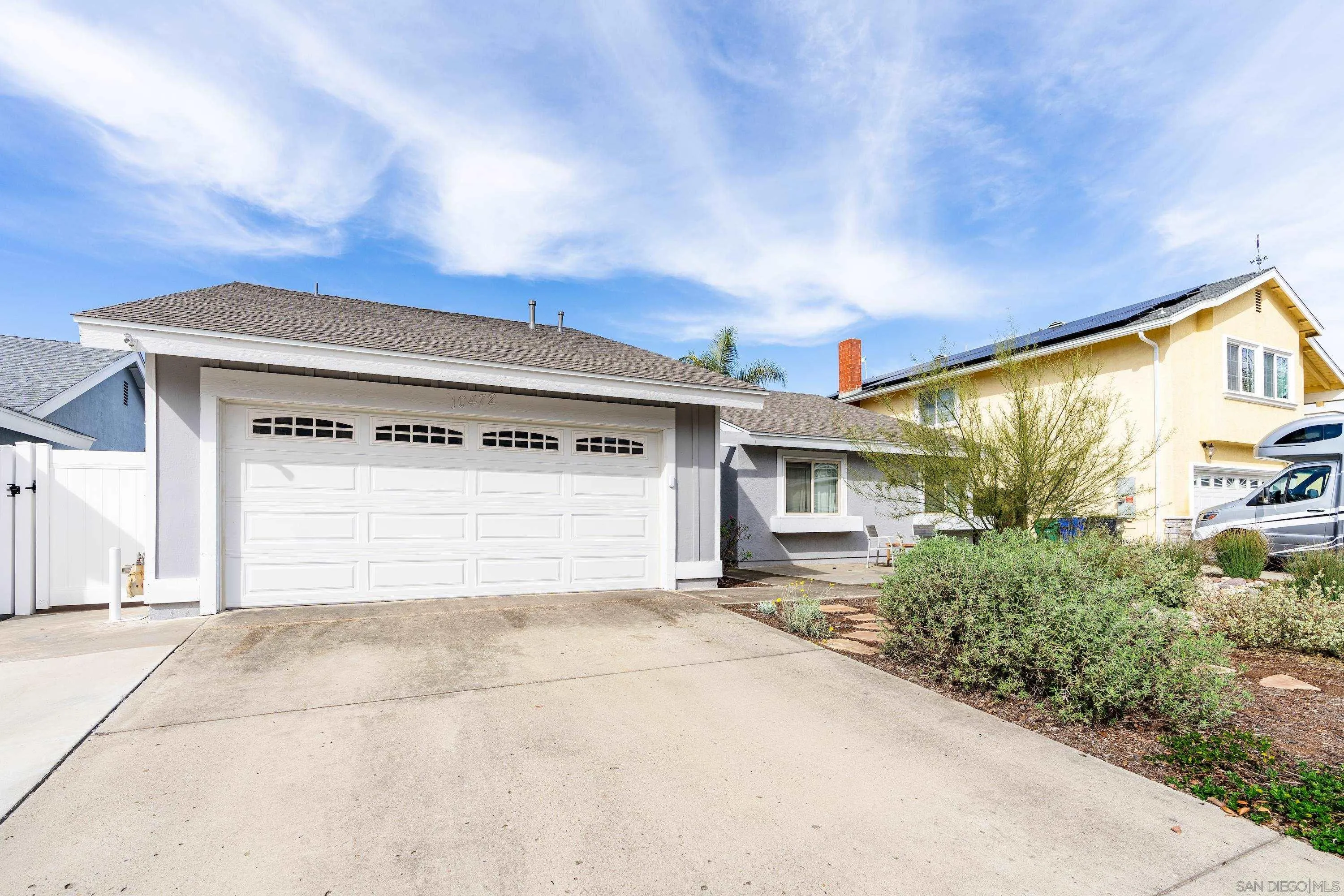 10472 Cadwell Road Santee, CA 92071 - Photo 4 of 30 a view of a house with a garage