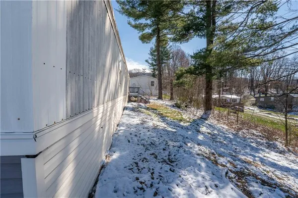 a view of a back yard of the house