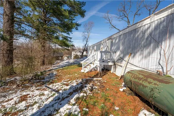 a view of yard along with trees