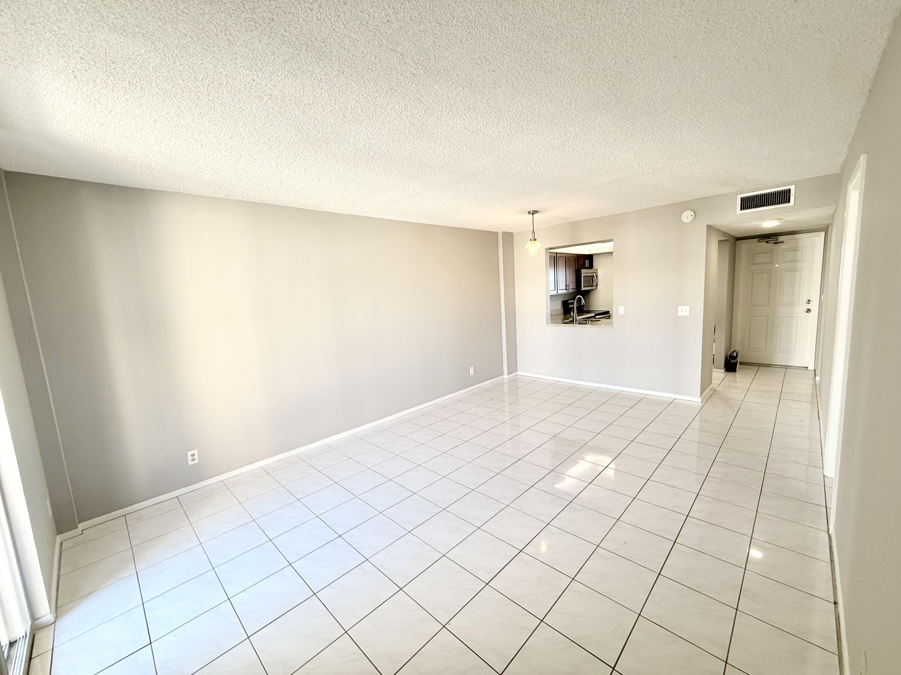 2929 South Ocean Boulevard, Unit 406 Boca Raton, FL 33432 - Photo 6 of 16 a view of a room & utility room