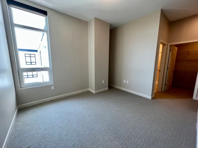 an empty room with windows