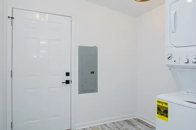 a bathroom with a shower toilet and sink