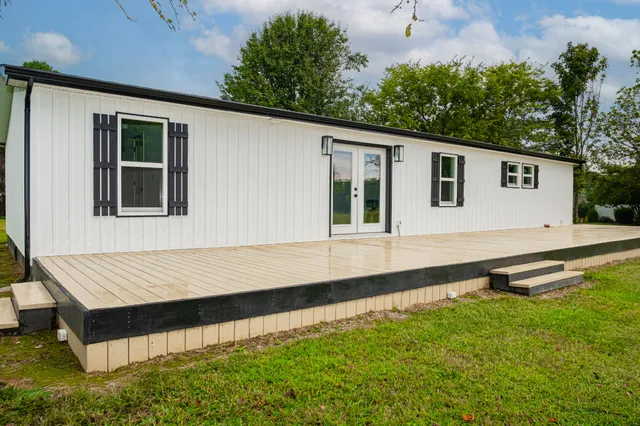 a view of a field with an outdoor space
