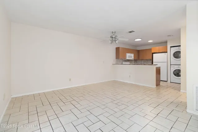 a view of a kitchen with a sink