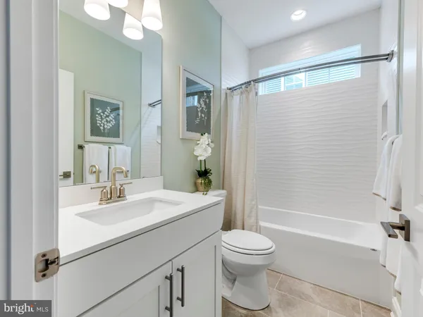 a bedroom with bed and window