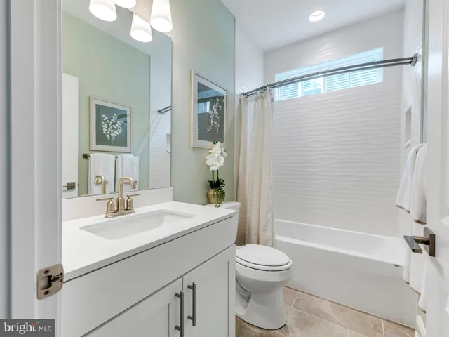 a bedroom with bed and window