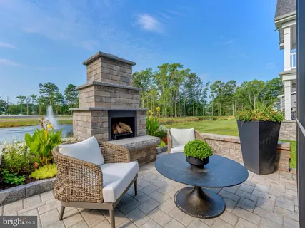 a view of an outdoor sitting area with furniture