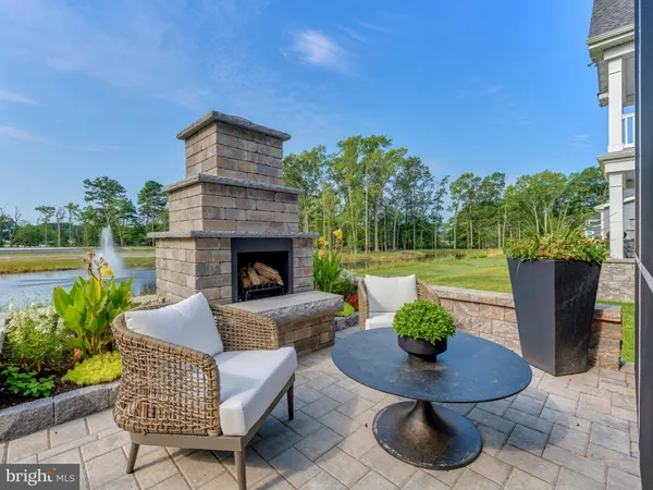 a view of an outdoor sitting area with furniture