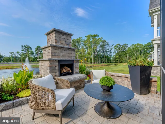 a view of an outdoor sitting area with furniture