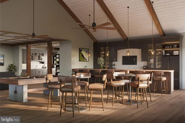 a view of a dining area with furniture and chandelier