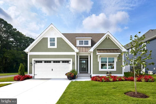 a picture of a cabinet with a white wall and a white refrigerator