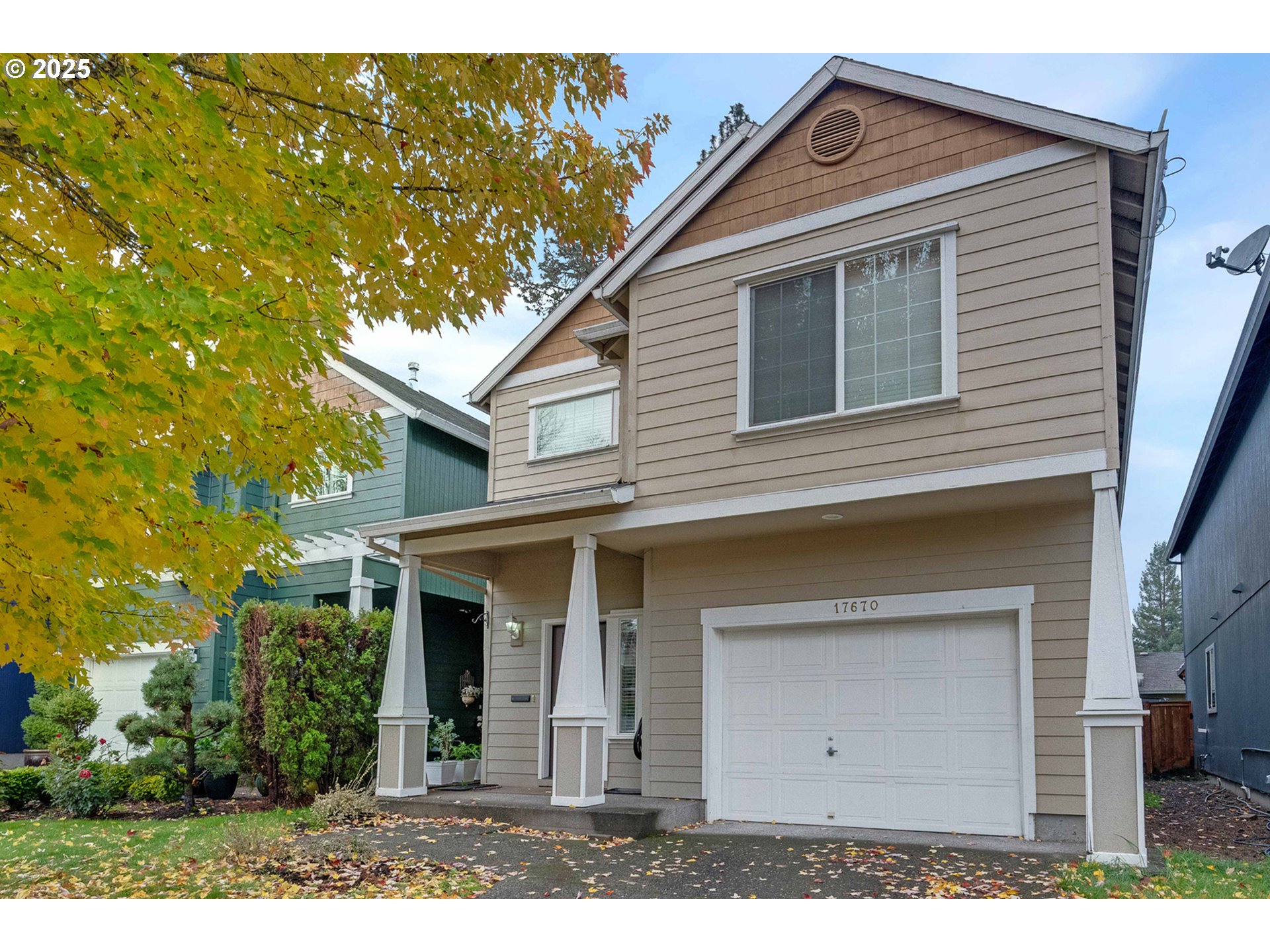 17670 Southwest September Lane Beaverton, OR 97003 - Photo 2 of 34 front view of a house with a small yard