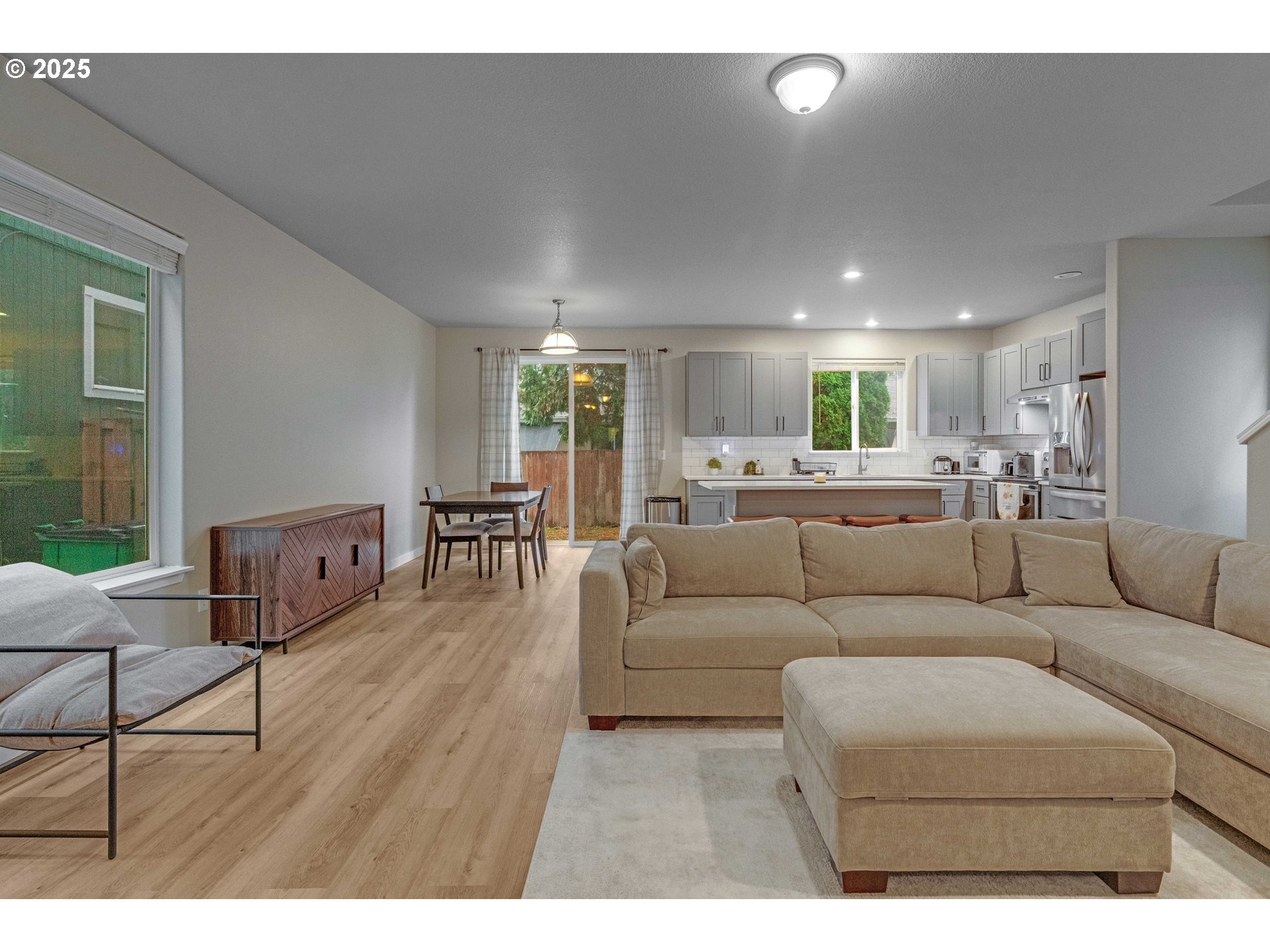 17670 Southwest September Lane Beaverton, OR 97003 - Photo 9 of 34 a living room with furniture and a wooden floor