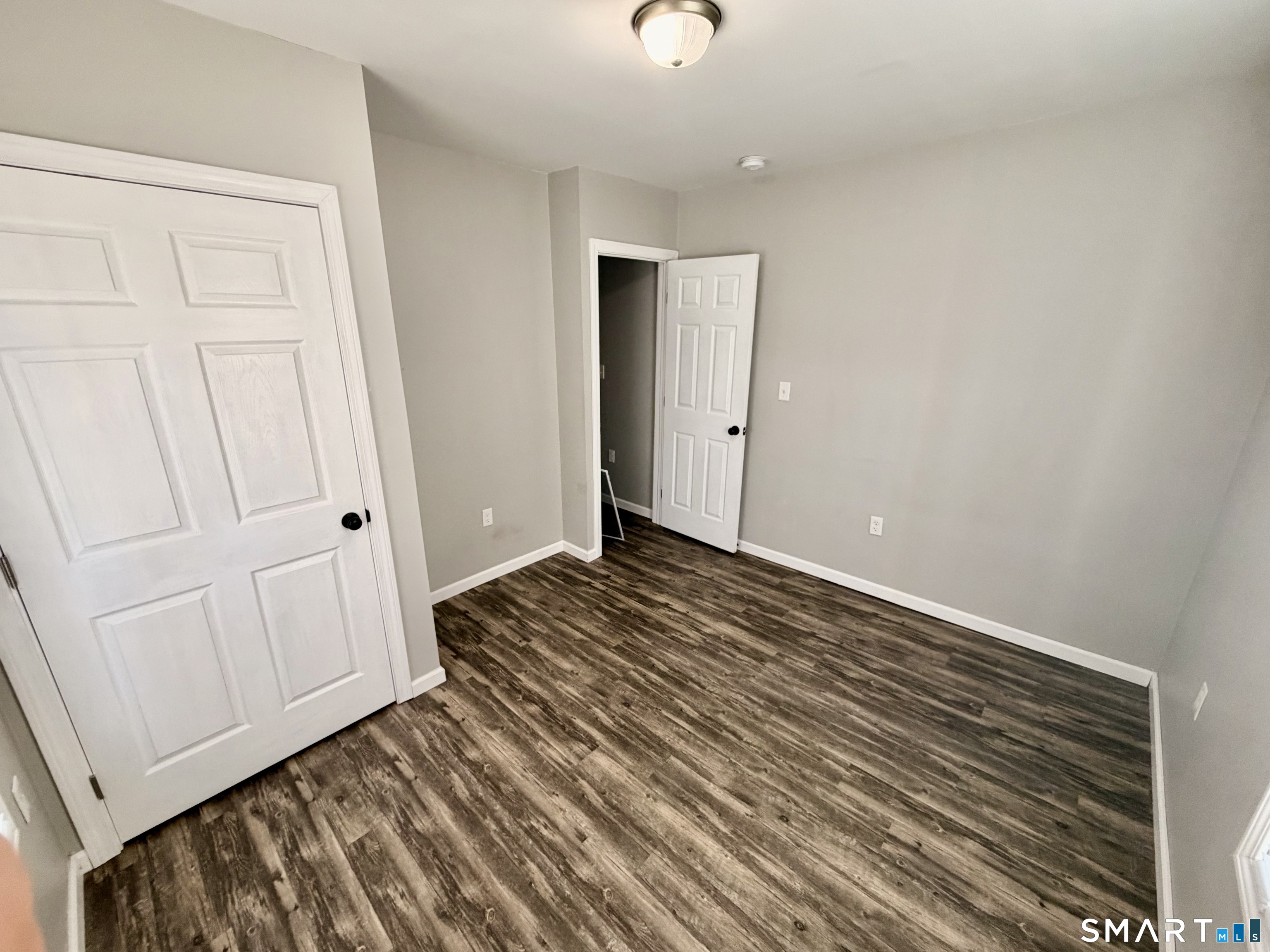 151 West Center Street Southington, CT 06489 - Photo 8 of 11 a view of a room with wooden floor